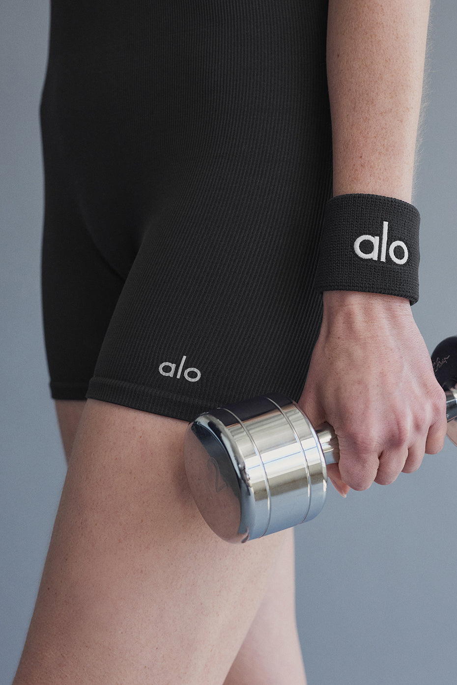 Athlete wearing glow wristbands during a night workout session.