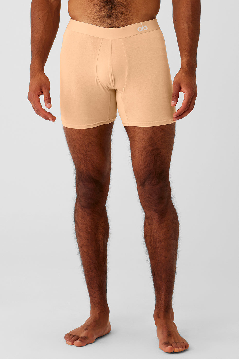 Lifestyle shot of men wearing comfortable boxers at home.
