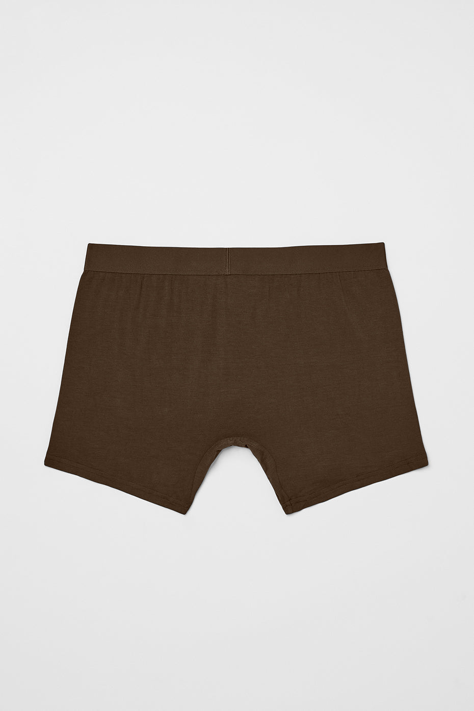 Model wearing espresso boxer shorts, demonstrating comfort and fit during daily activities.
