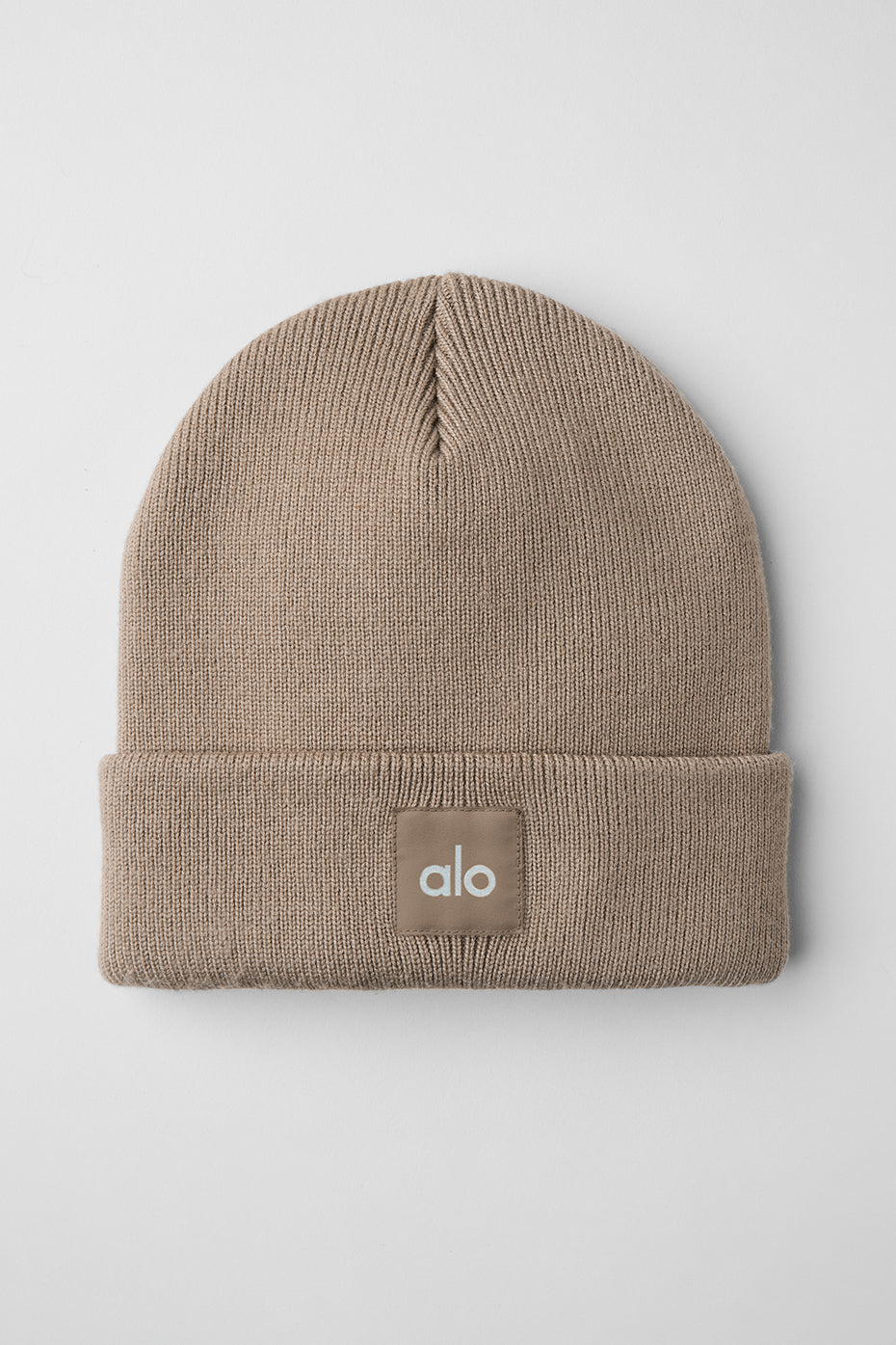 Front view of the gravel merino wool beanie for men, ideal for cold weather.