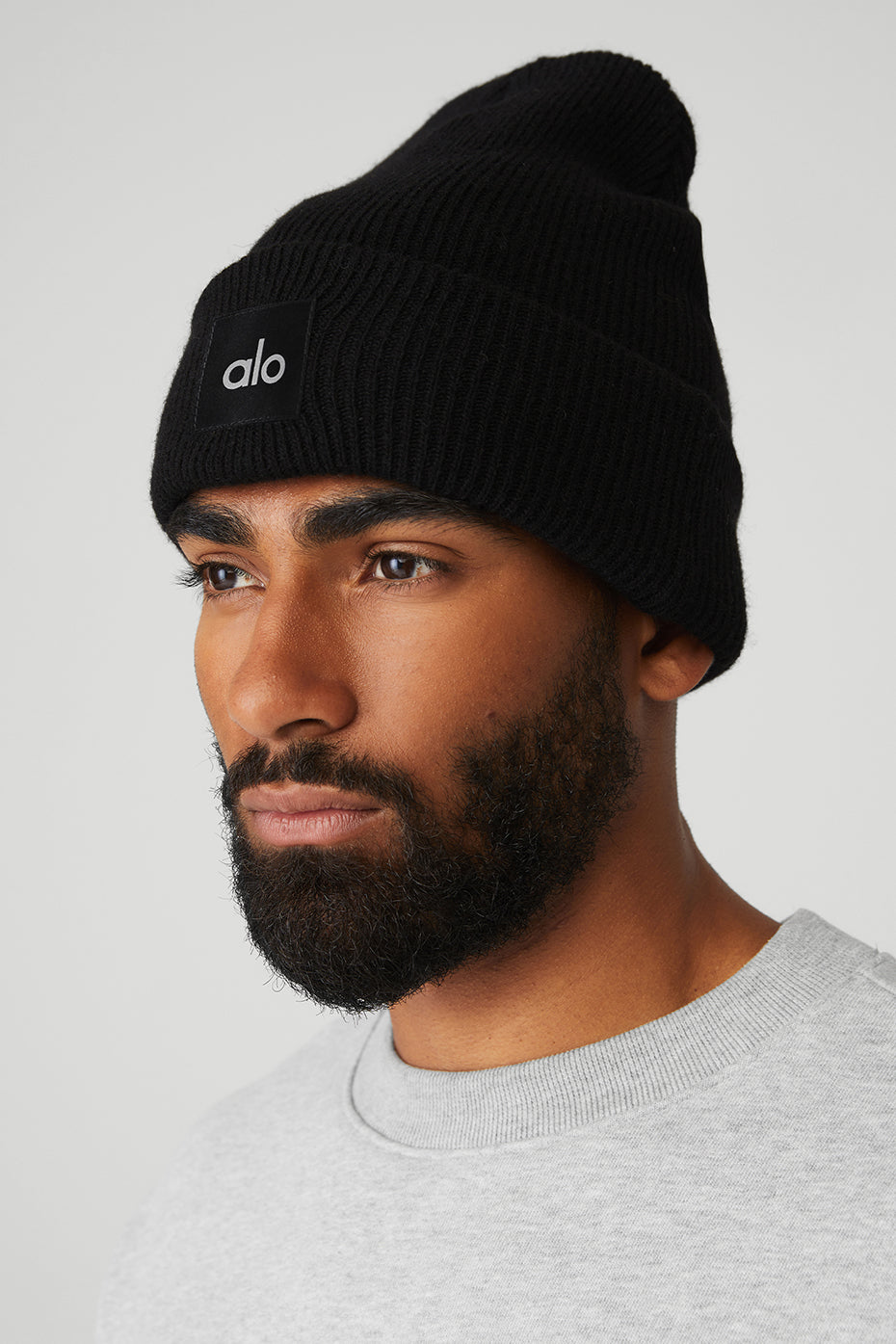 Styled with casual winter outfit featuring the beanie