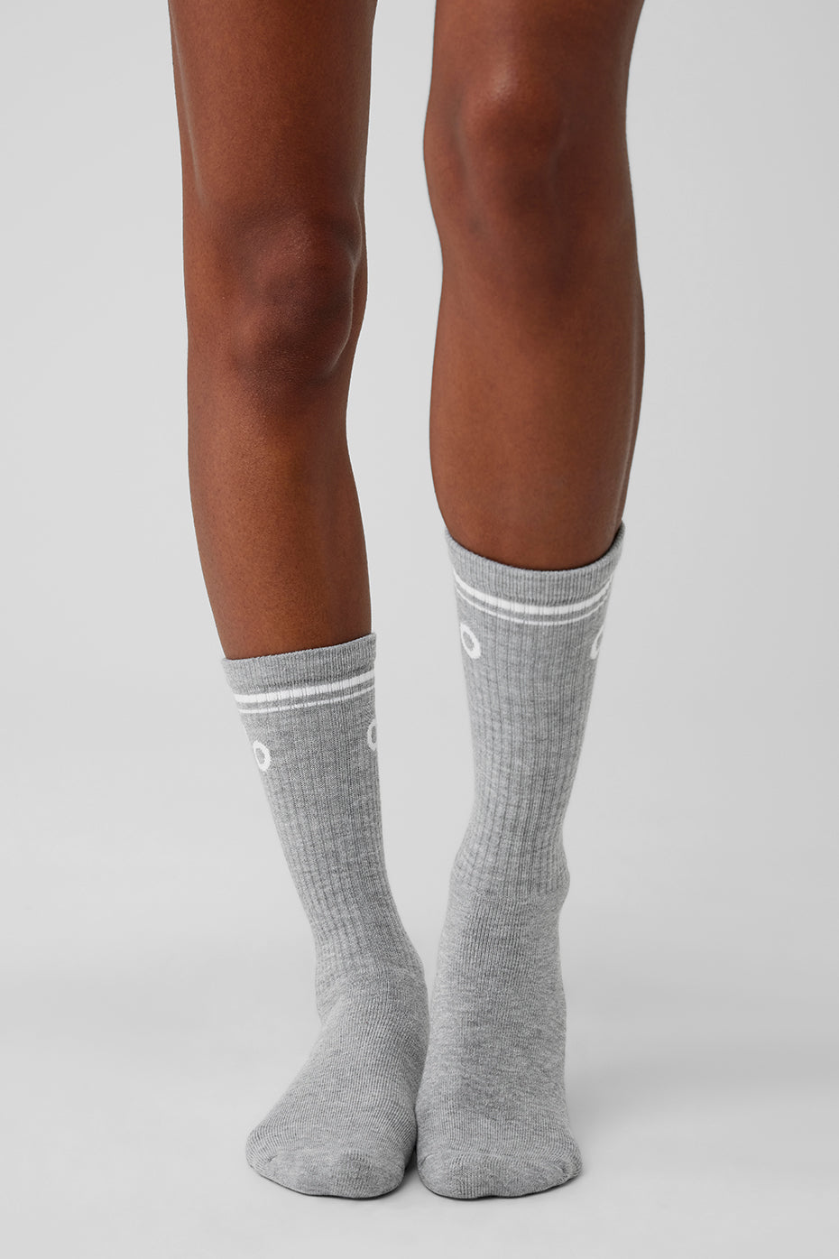 Model wearing comfortable athletic compression socks during workout