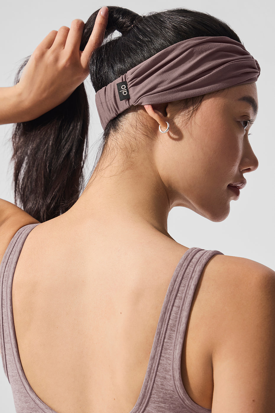 Headband displayed with other fitness accessories for everyday use
