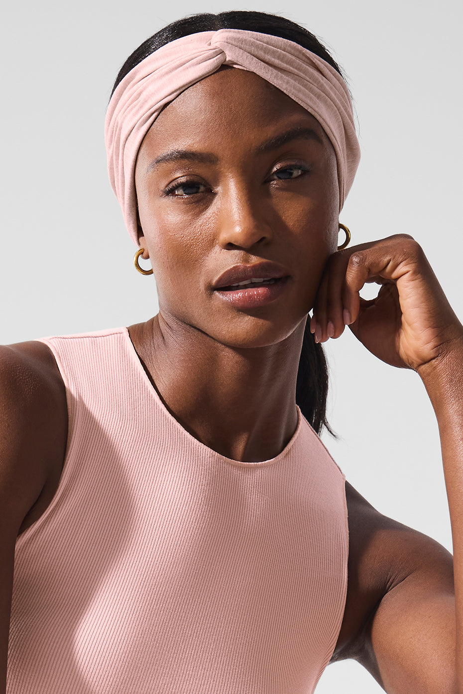 Alosoft headband in Pink Quartz Heather styled for yoga practice