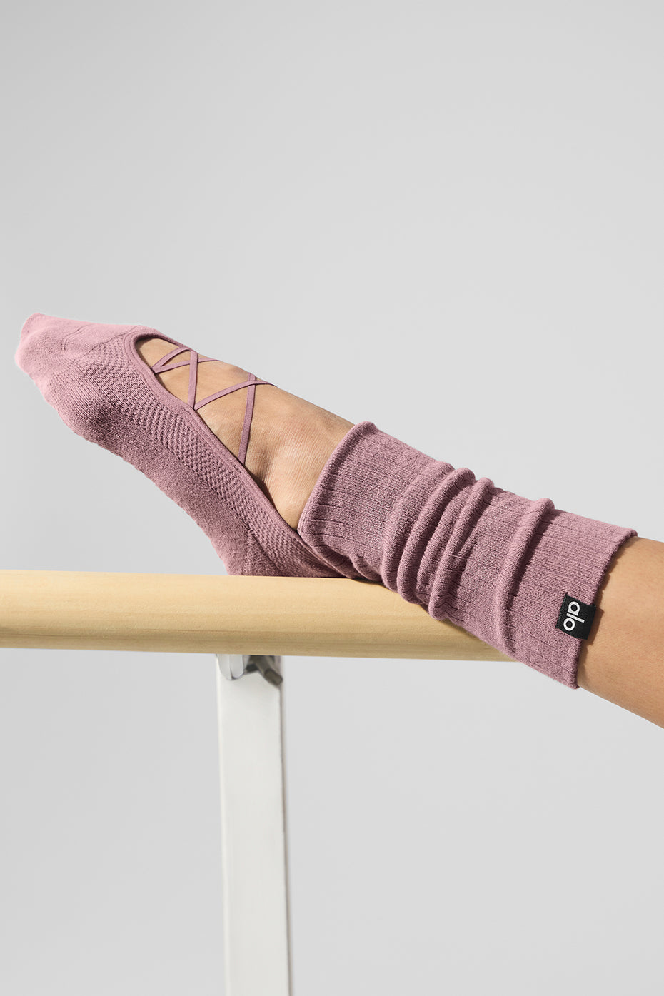 Top-down angle of pure barre socks showcasing non-slip silicone grip pattern