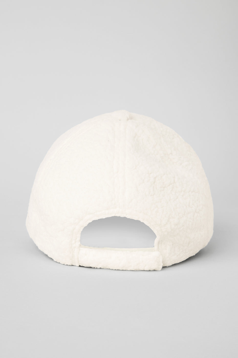 Side view showcasing the adjustable Velcro strap of the dad hat.