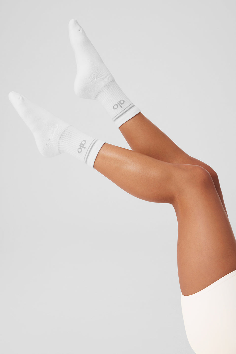 Close-up of throwback unisex socks showing the stripe detail and plush cushioning