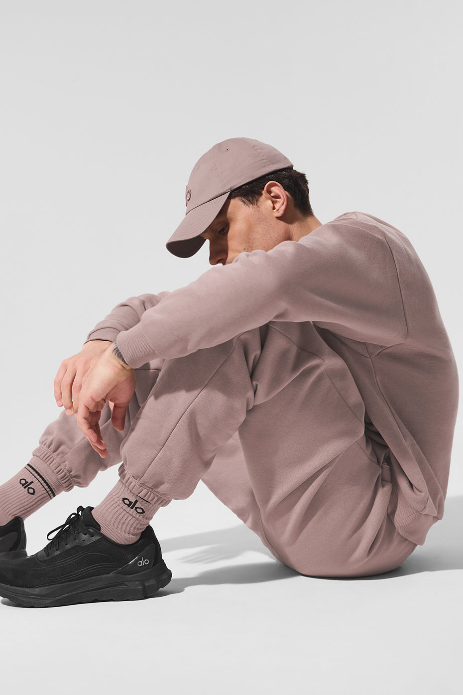 Fashionable crew socks worn scrunched with shorts and sneakers