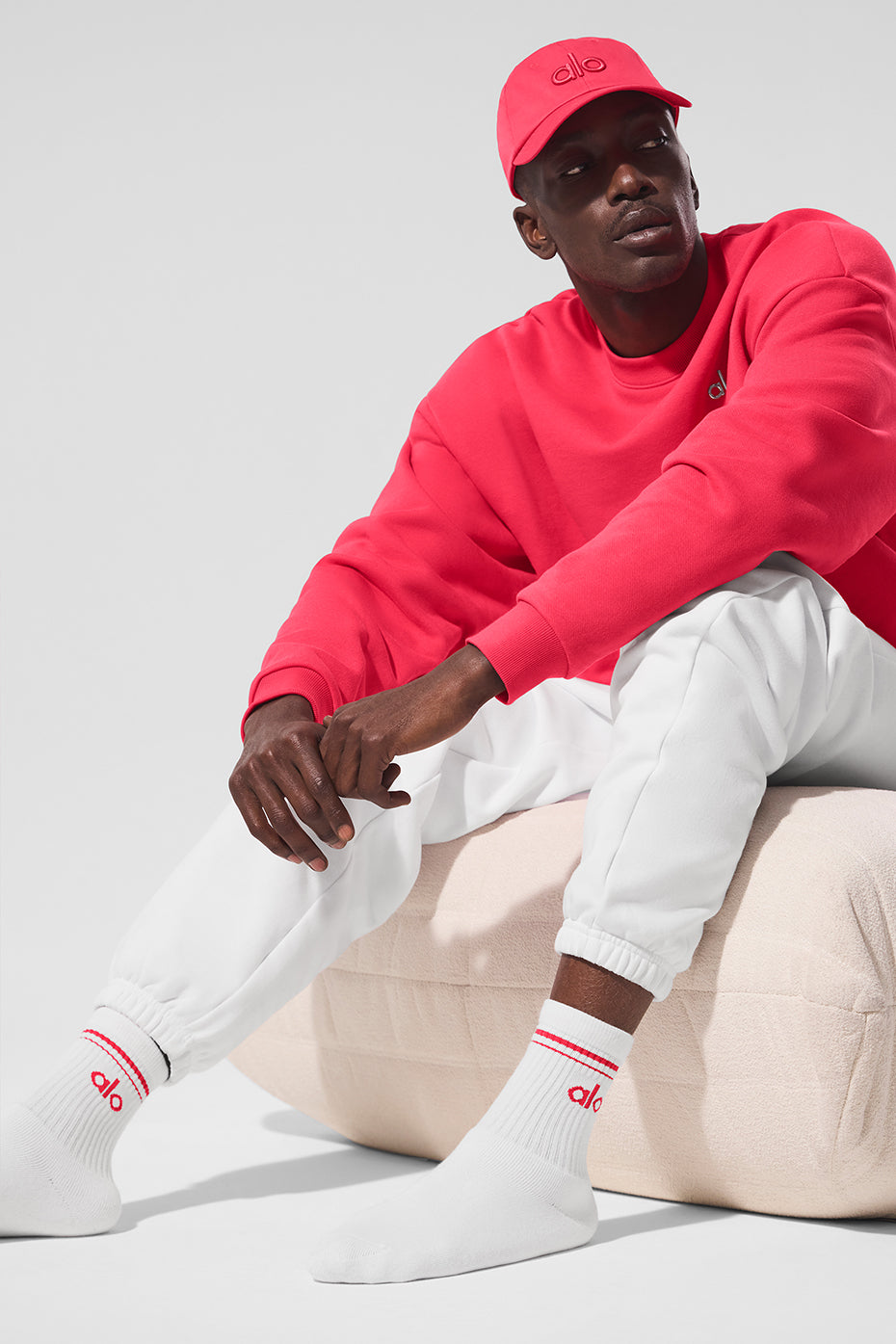 Flat lay of retro crew socks in white and candy red, perfect for casual outfits.