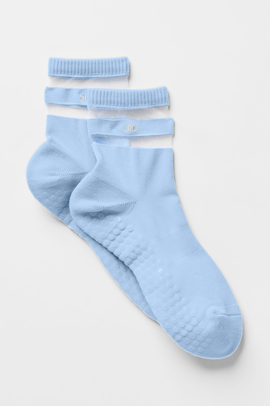 Women's grip socks with textured grips and cushioned toes in Seashell Blue, ideal for yoga and pilates