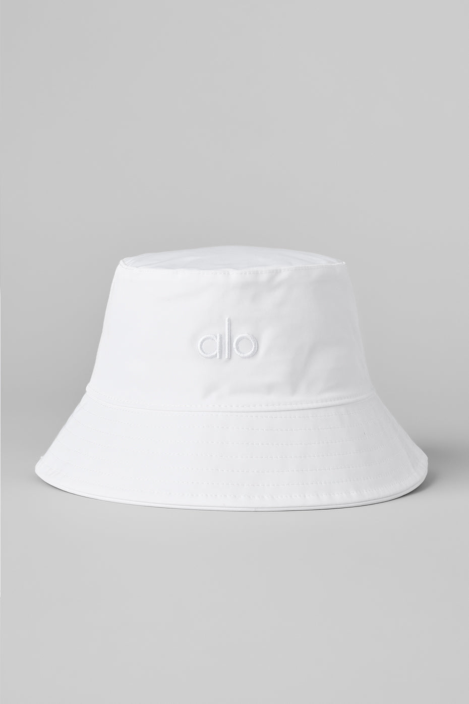 Side angle showing adjustable elastic stopper inside bucket hat