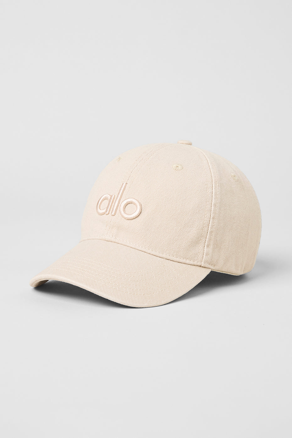 Front view of the vintage washed off-duty cap in sand dollar color.