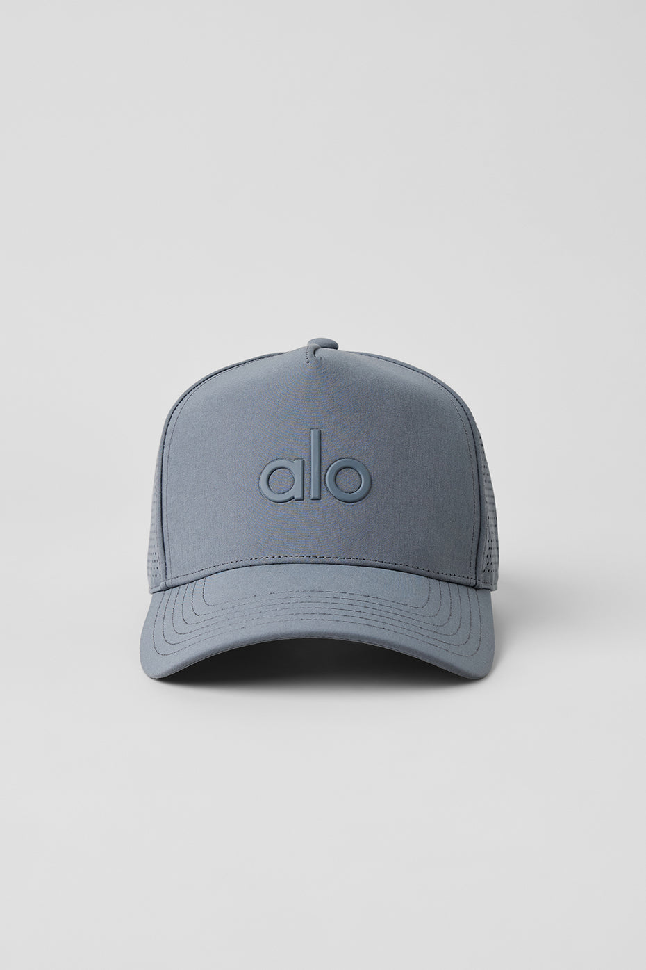 Lifestyle shot of the performance hat being worn during a hike in the mountains.