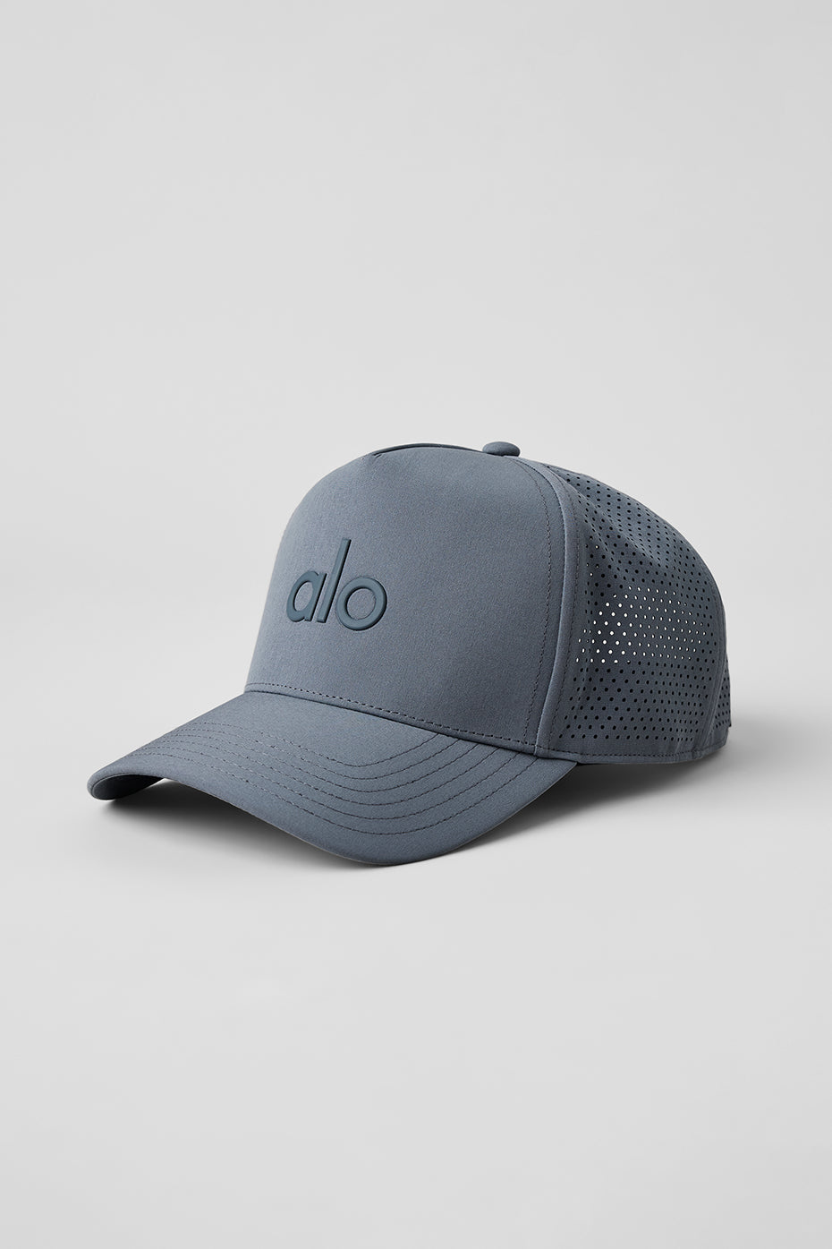 Front view of the Performance District Trucker Hat in Steel Grey, showcasing its structured design.