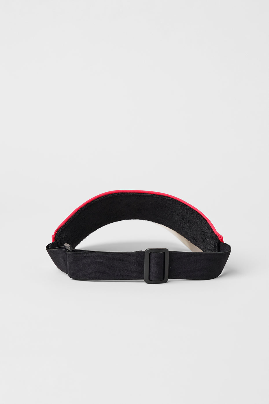 Close-up of the candy red tennis visor showcasing its holographic brim.