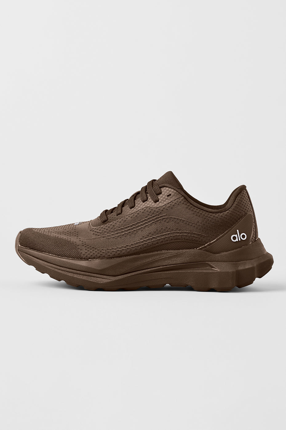 Side view of ALO Runner - Espresso highlighting the dual-density midsole for stability