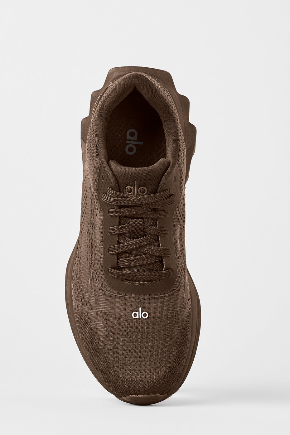 Side view of ALO Runner - Espresso highlighting the dual-density midsole for stability