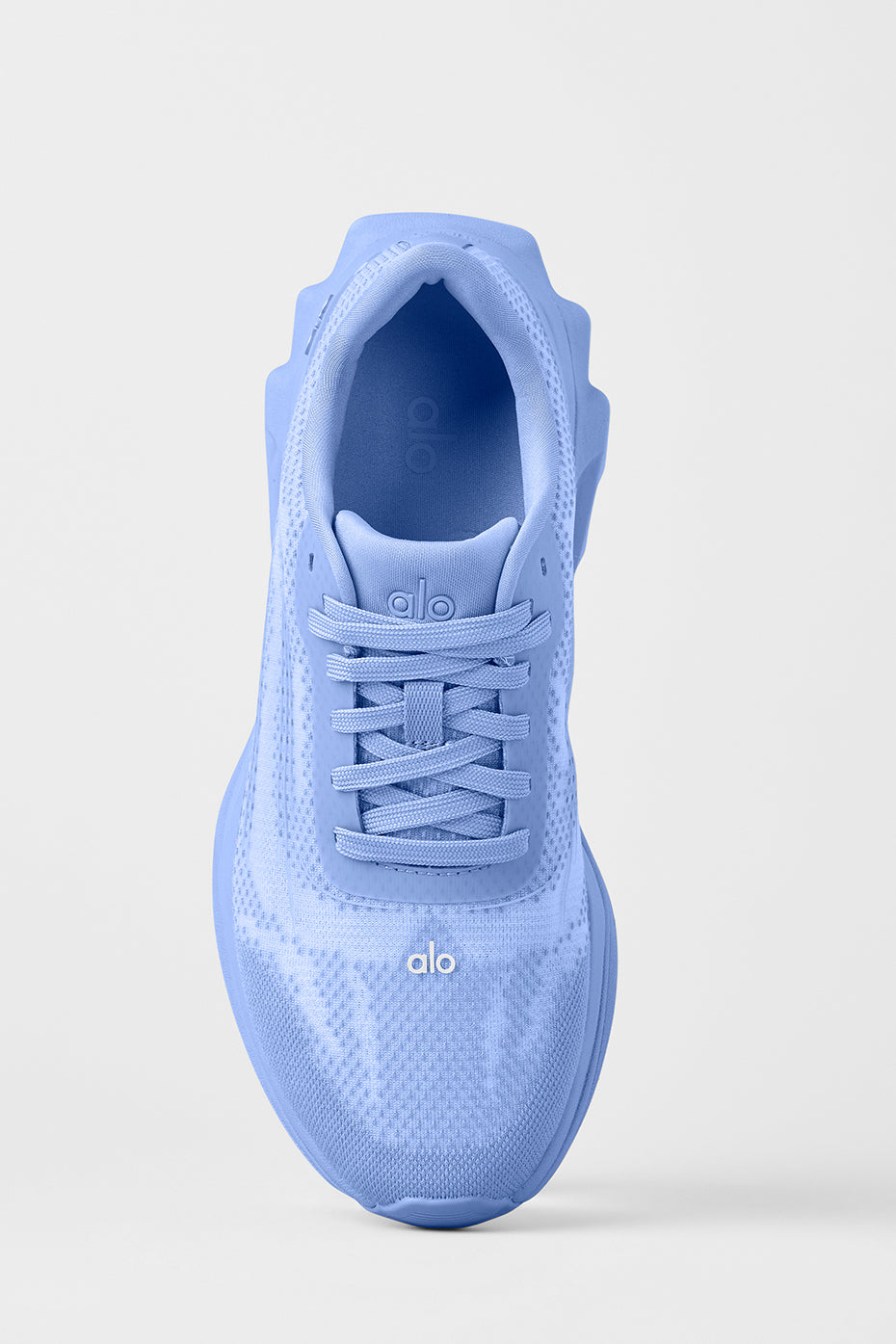 ALO Runner sneakers showcasing the crystal clear blue color, ideal for outdoor activities.