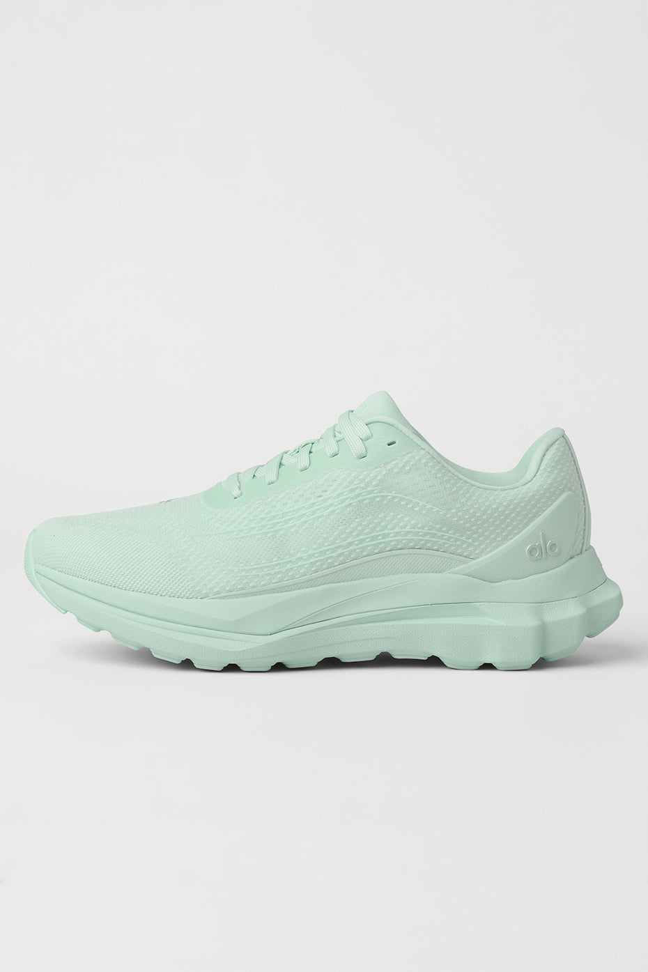 ALO Runner stability shoes side view on hiking trail