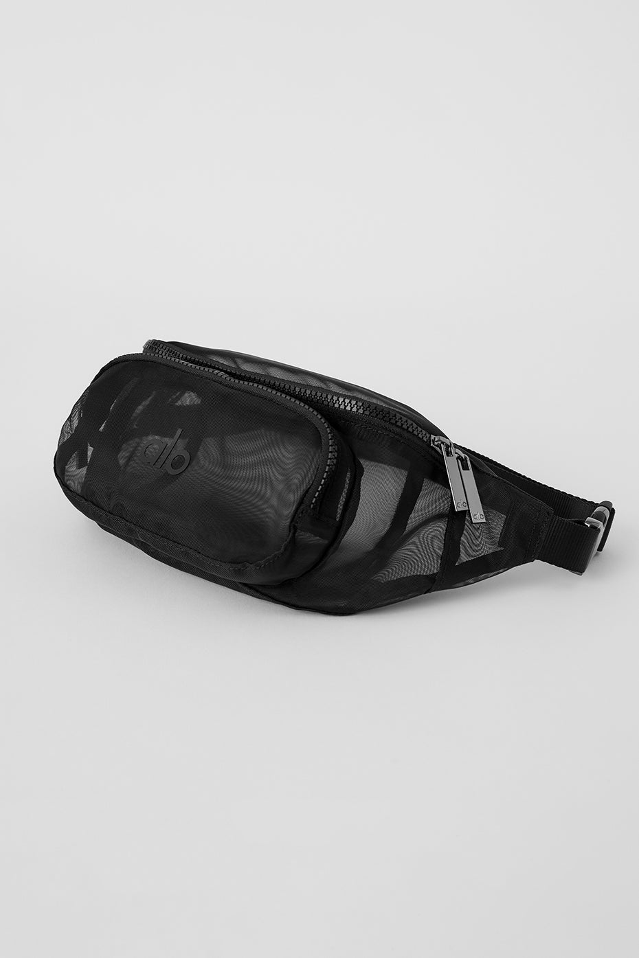 Front view of the transparent mesh fanny pack, showcasing its spacious compartments.