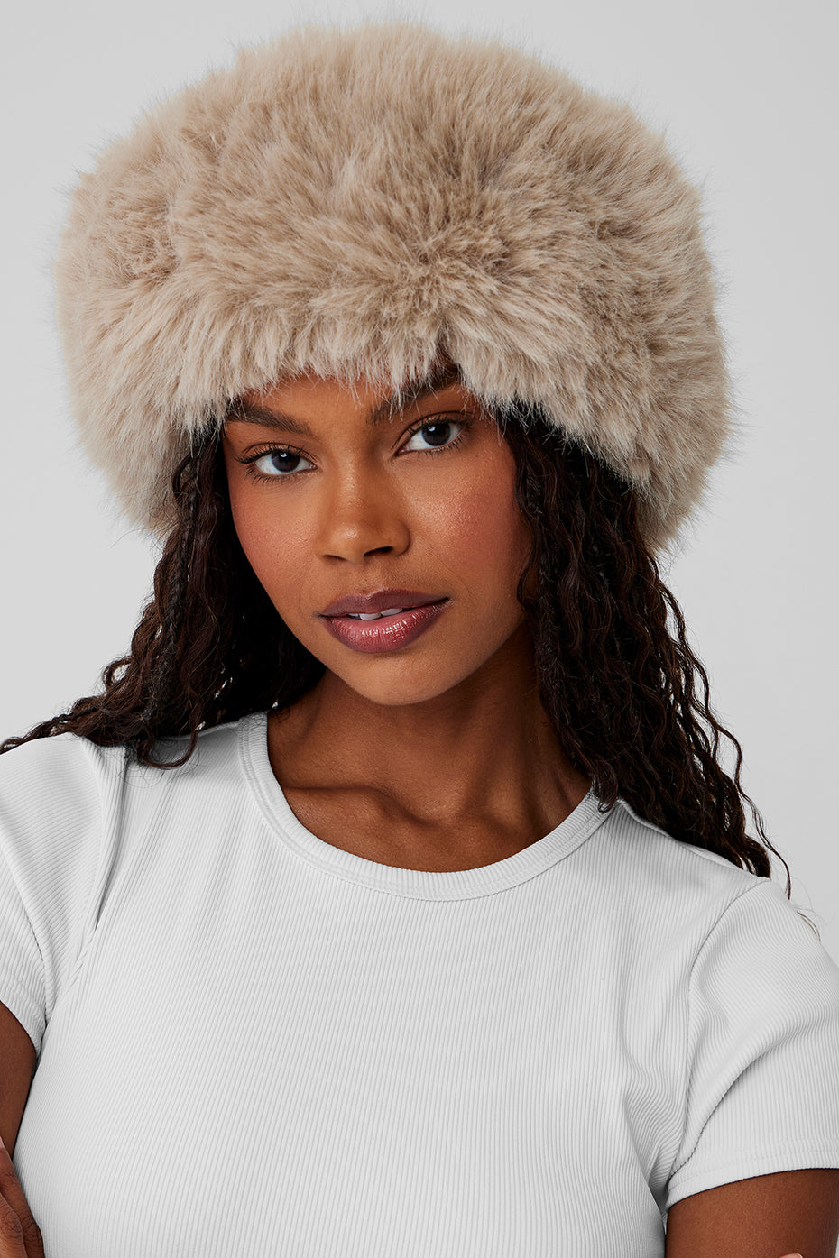 Luxe faux fur headband worn outdoors, showcasing its stylish look.