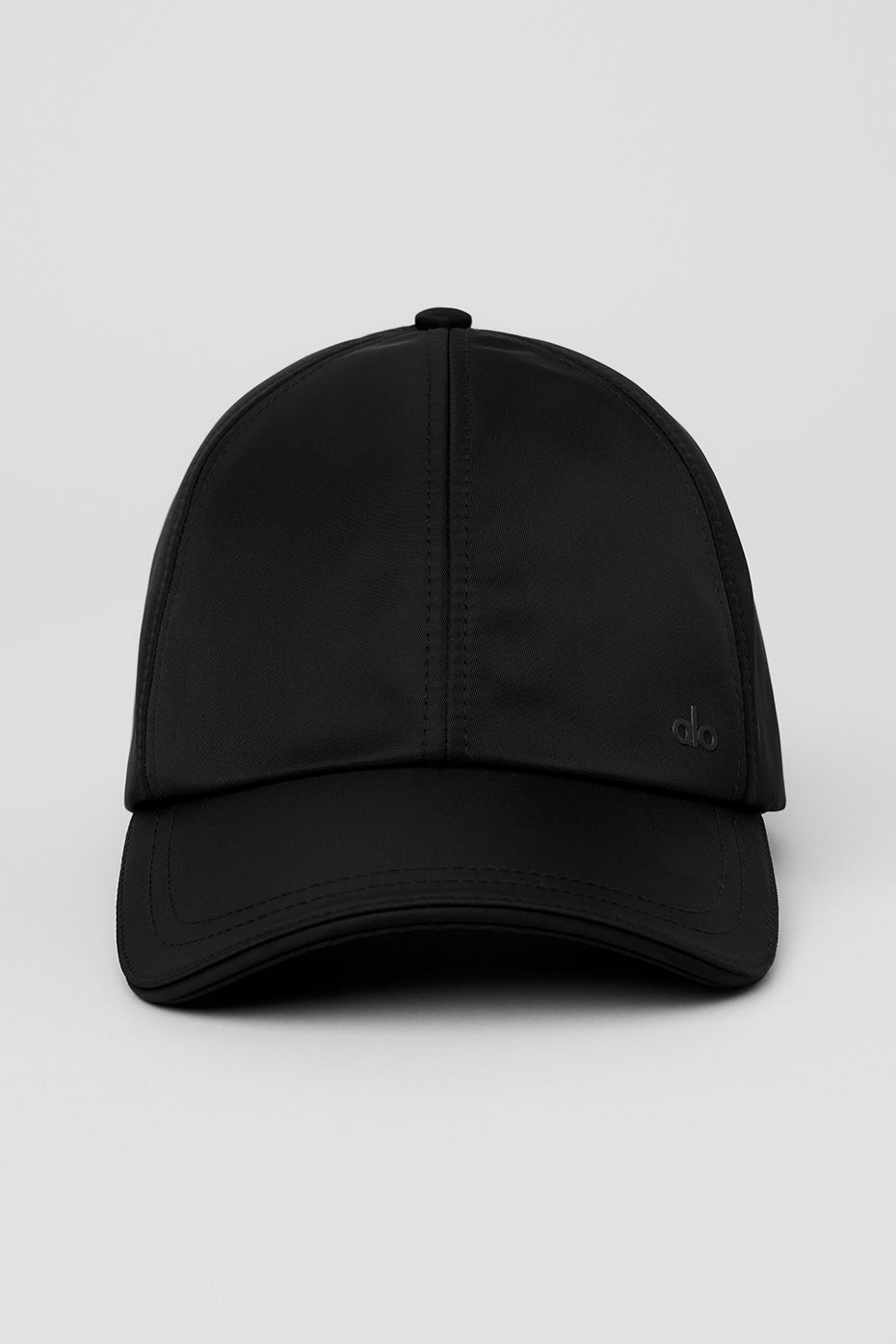 Front view of the satin luxury off-duty hat in black, showcasing its sleek design.