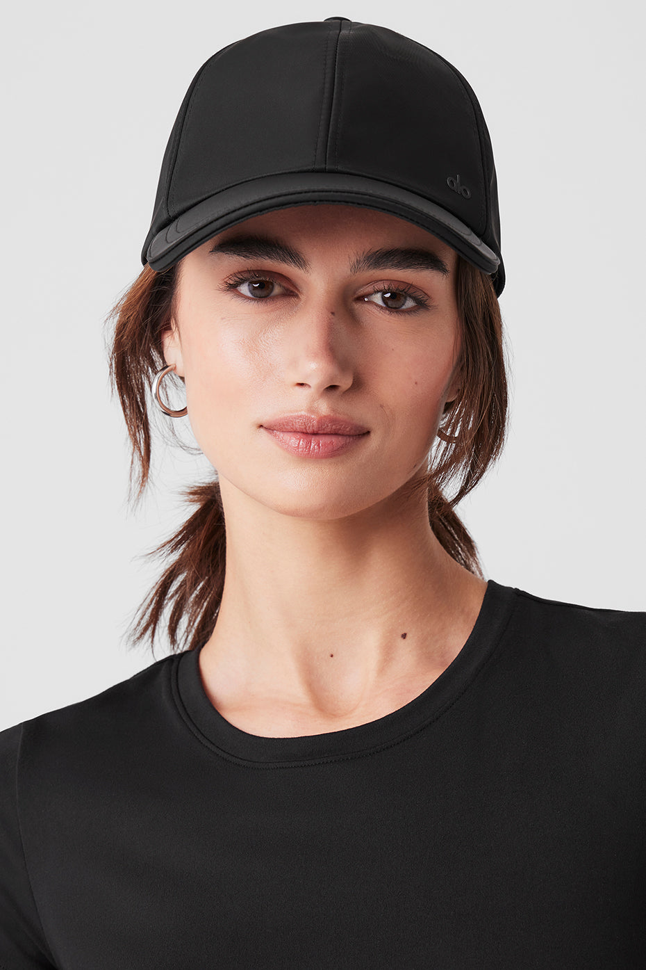 Side angle of the satin lined baseball cap, highlighting the adjustable buckle.