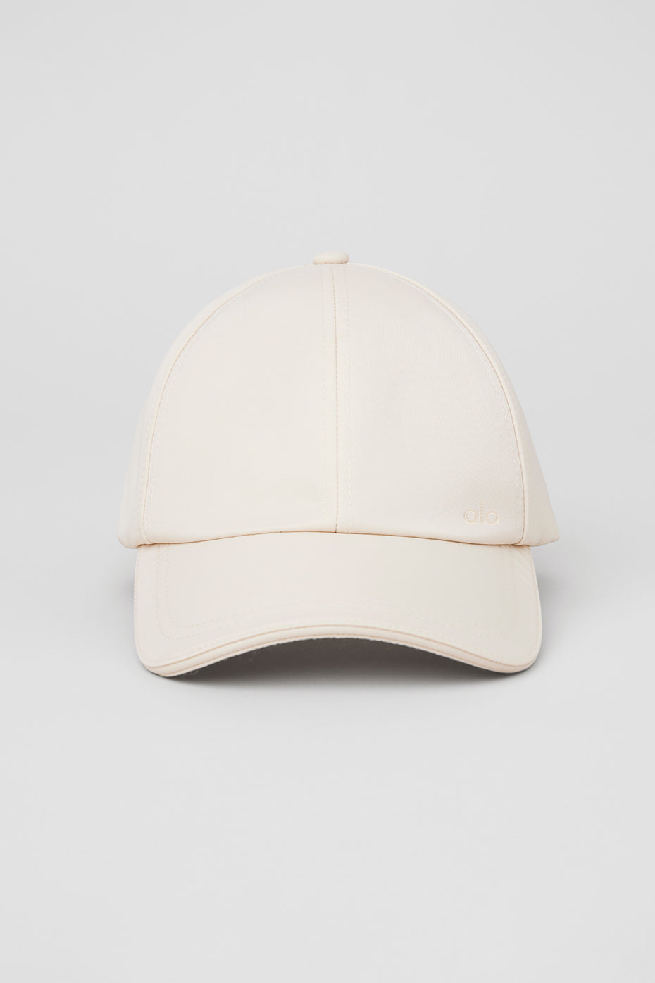 Satin Luxe Off-Duty Bucket Hat in creme, showcasing the shiny buckle and curved brim.