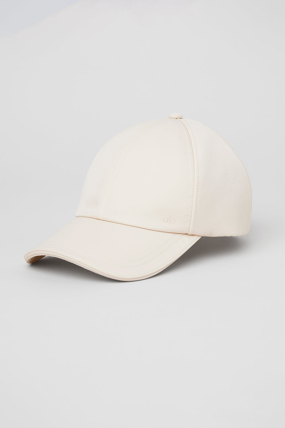 Satin Luxe Off-Duty Bucket Hat in creme, showcasing the shiny buckle and curved brim.