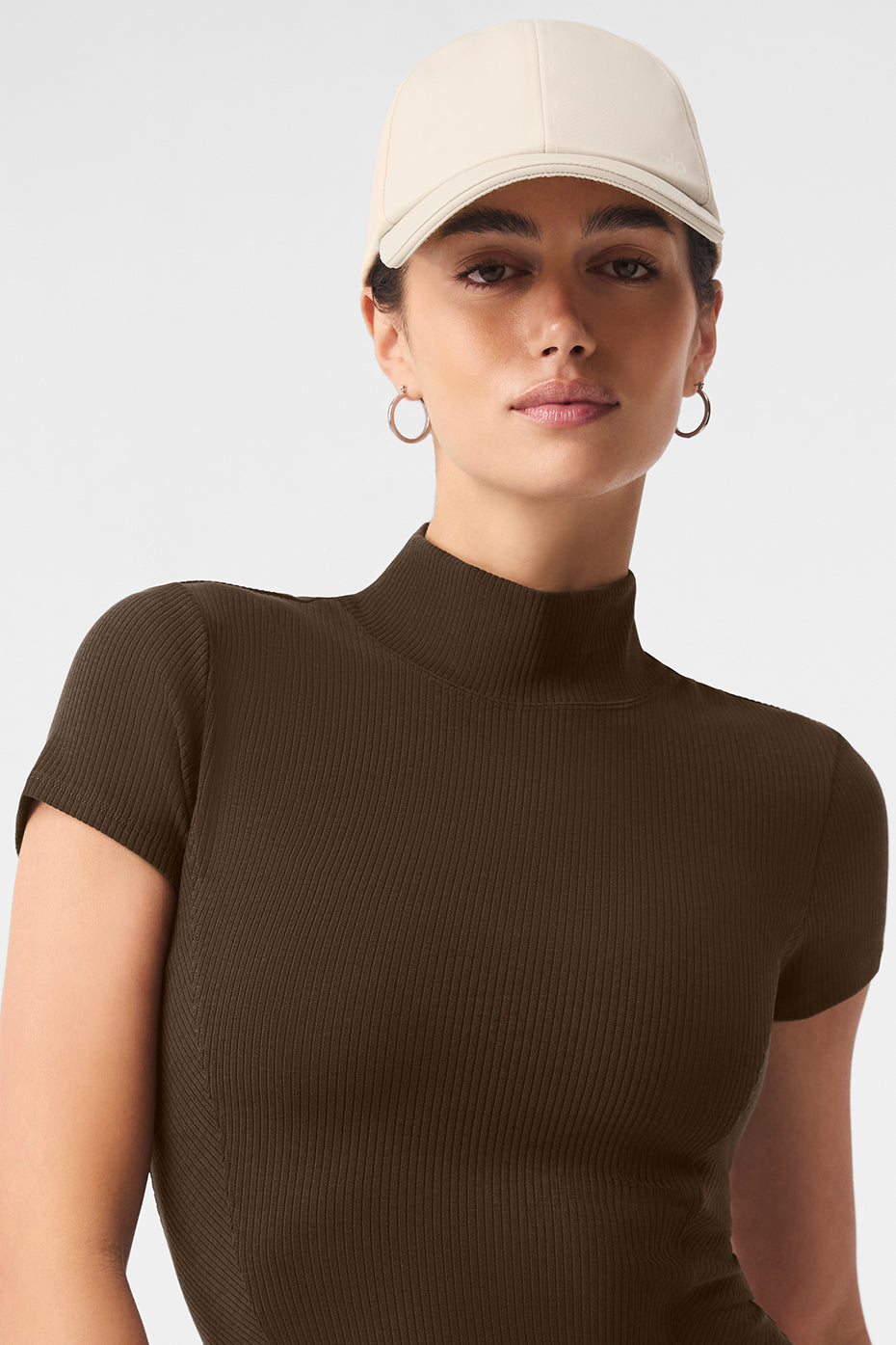 Model wearing the satin skull cap with a chic outfit, perfect for casual outings.