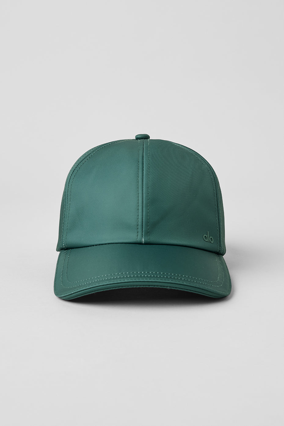 Side view of satin off-duty hat showing curved brim and buckle detail