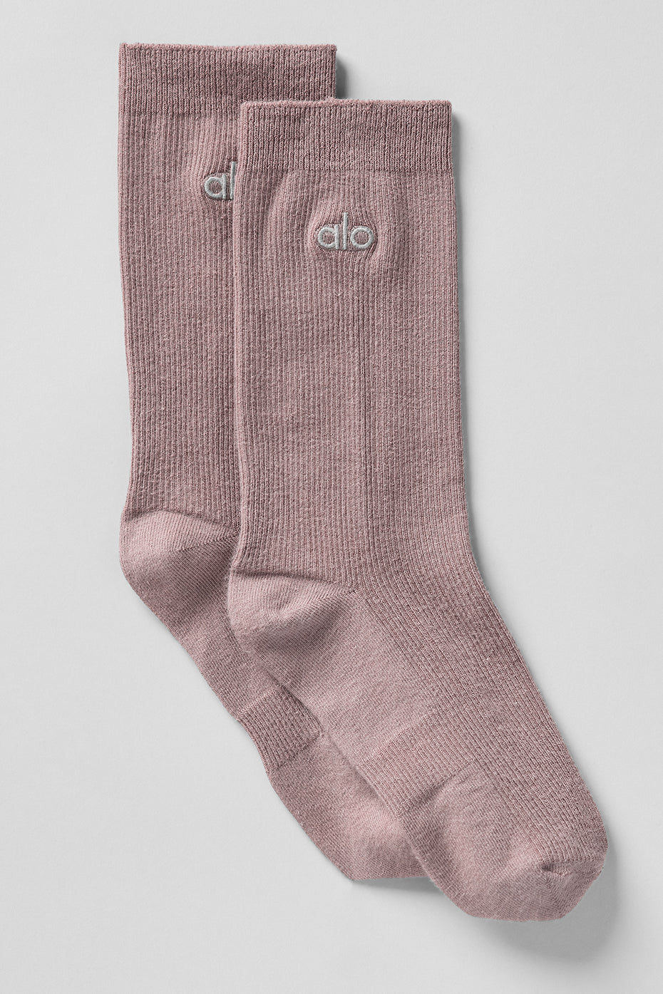 Close-up of mushroom unisex ankle socks with silver logo.