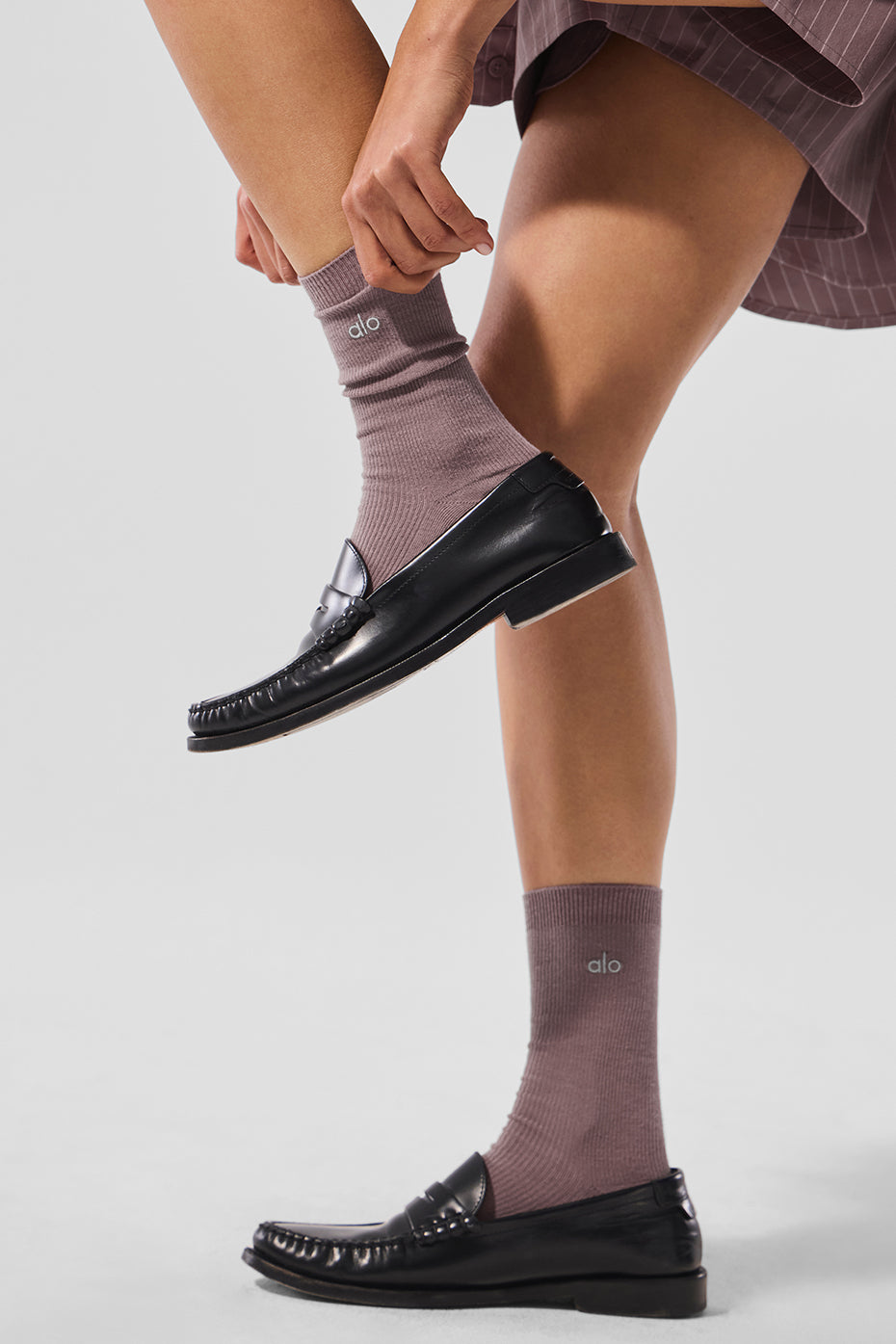 Mushroom ankle socks styled with casual footwear.