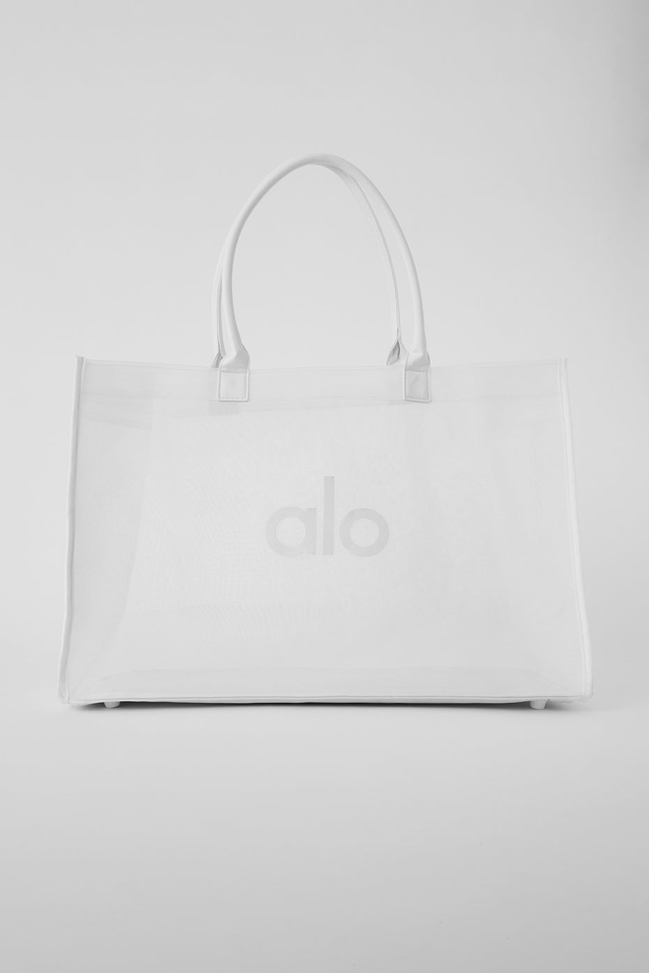 Close-up of canvas texture and breathable mesh material highlighting side pocket design