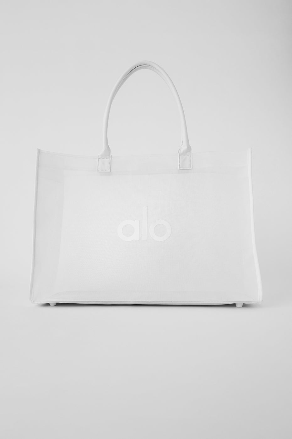 Close-up of canvas texture and breathable mesh material highlighting side pocket design