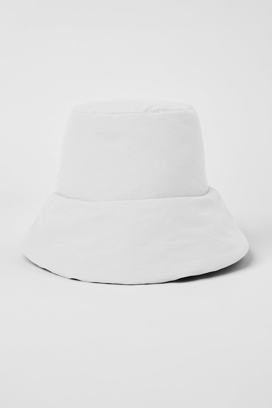 Side angle showing wide brim and adjustable drawstring of the bucket hat