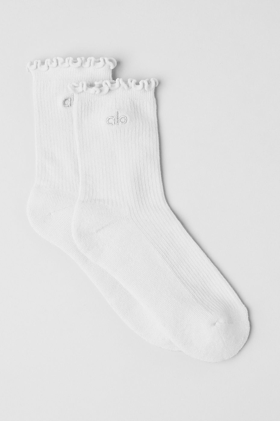 Close-up of the fashion sock’s ruffled edge and stretch-knit texture