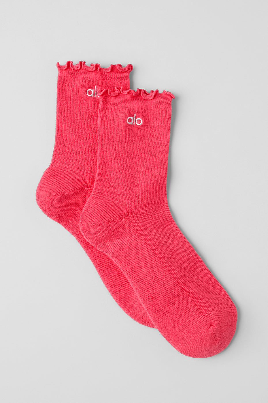 Close-up of the stretchy, comfortable fabric of the cute socks in bright red