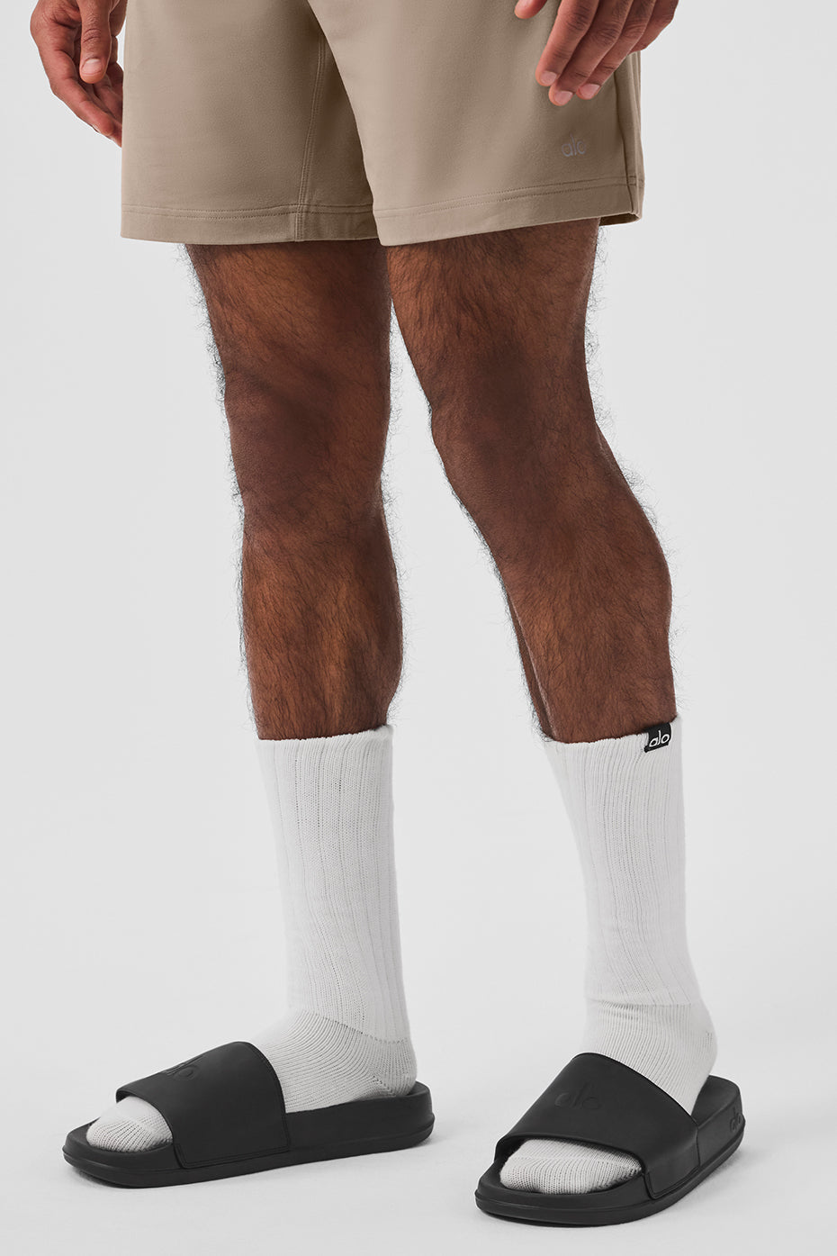 Side view of slip-resistant sole on black slides designed for everyday comfort