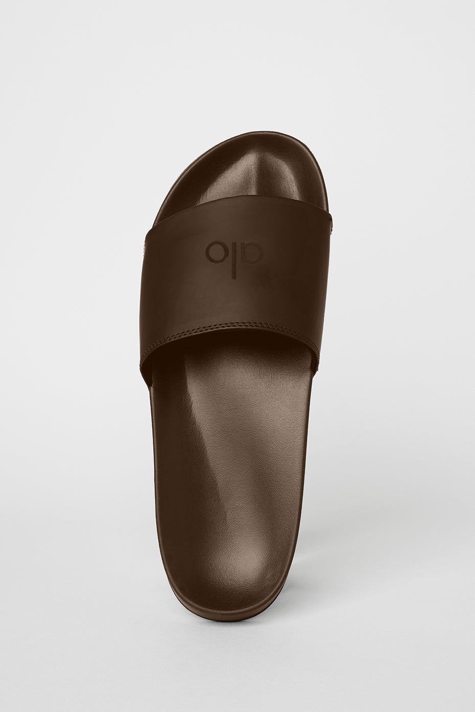 Lifestyle shot of Cloud Comfort Slide Sandals worn casually outdoors.