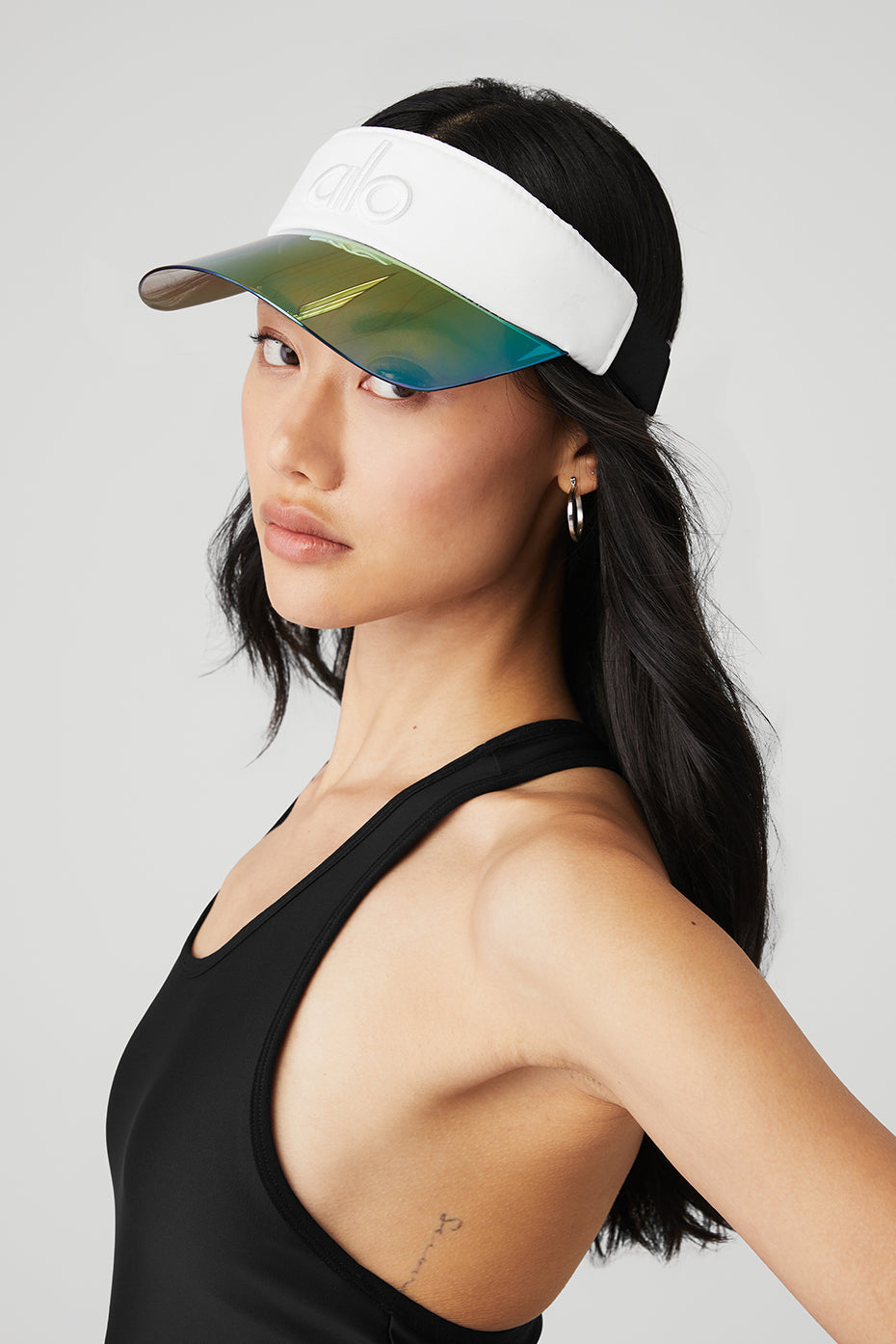 Close-up of Airlift solar visor showcasing adjustable buckle and sweat-wicking fabric.
