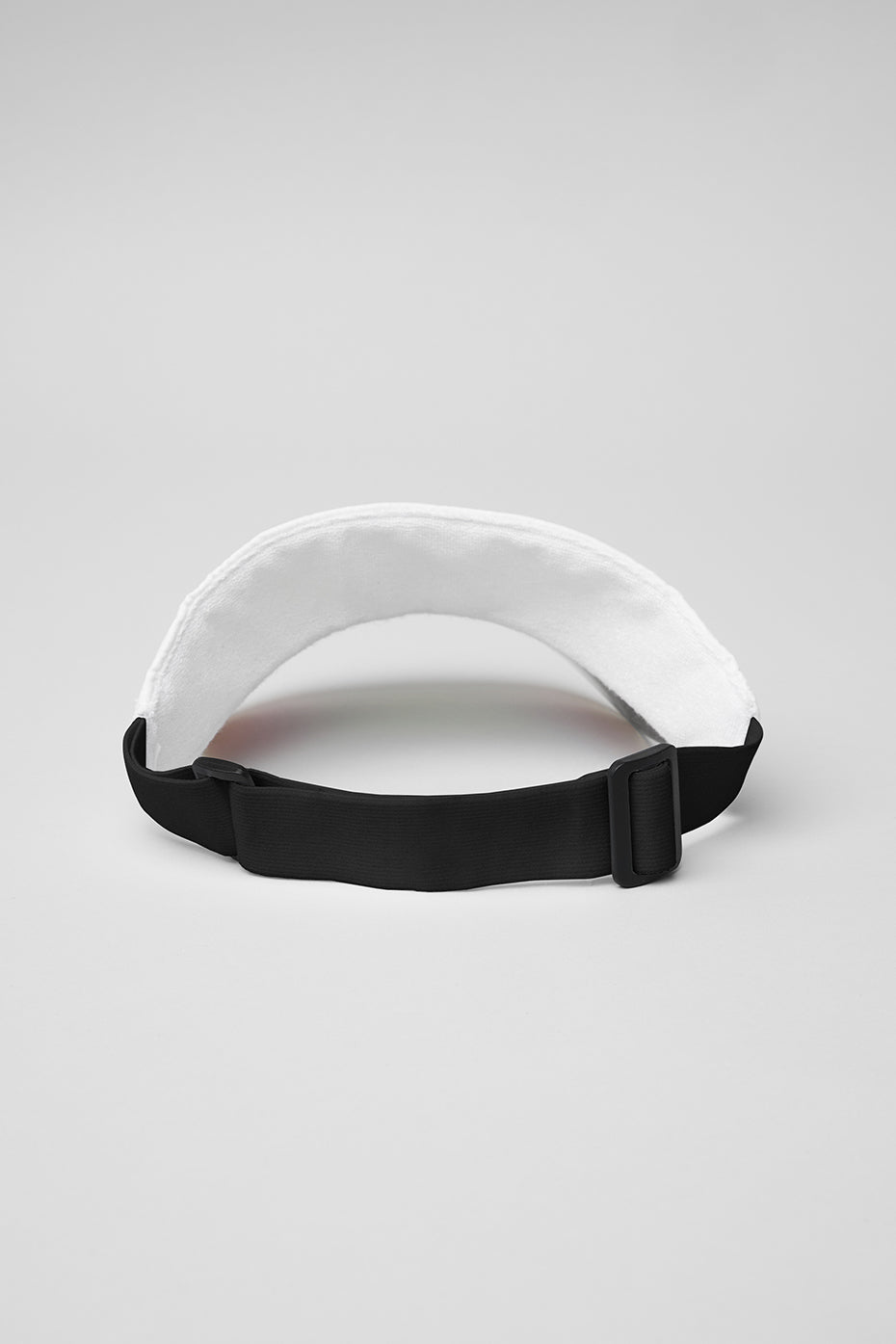 Ladies white tennis visor with holographic brim, perfect for sunny days.