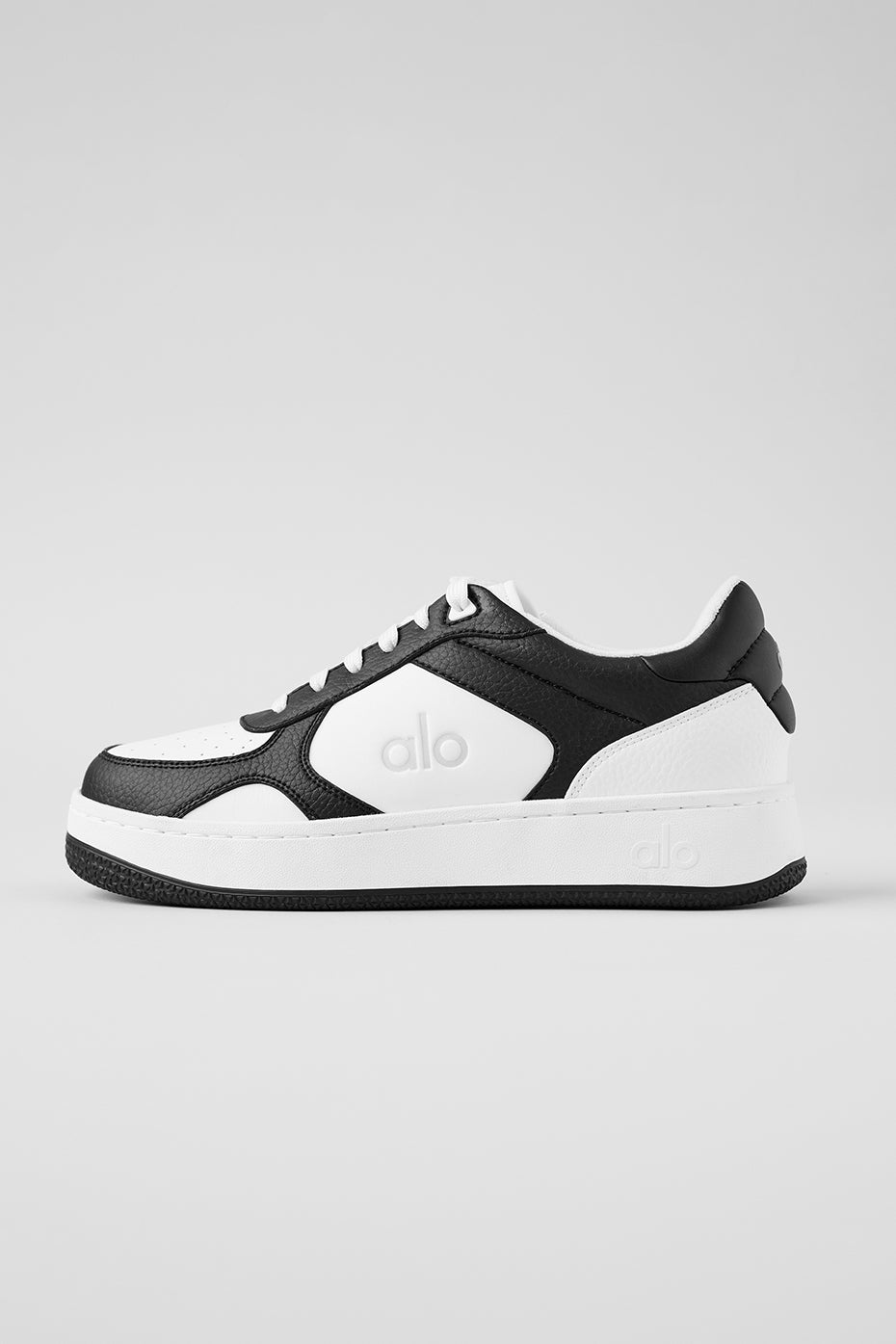 Side view of Kane Recovery Sneakers showcasing sleek design.