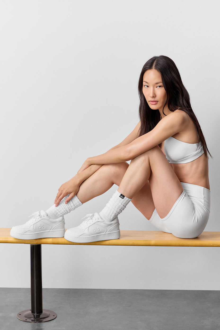 Vegan sneakers on a city street, demonstrating their stylish and durable construction