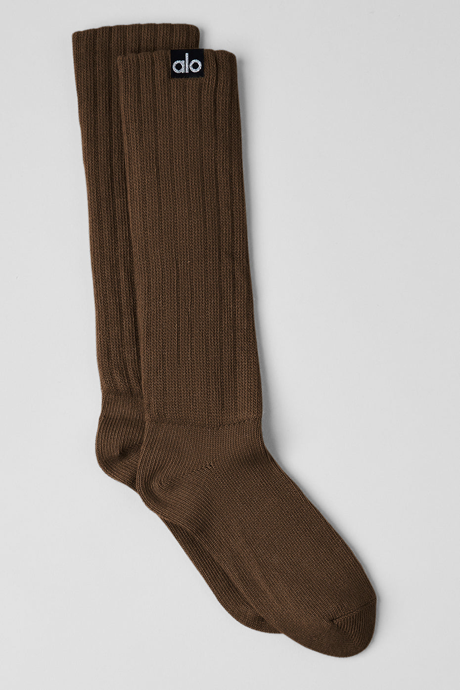 Close-up of espresso scrunch crew socks showing the fabric texture.
