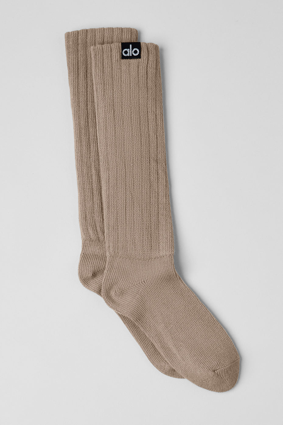 Close-up of breathable white scrunch socks for unisex use.