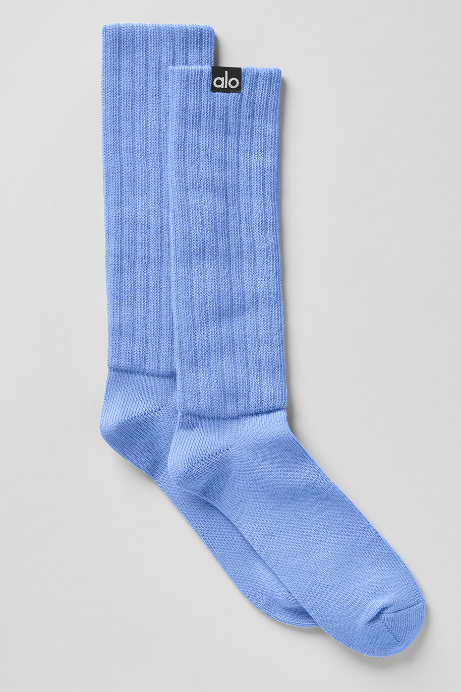 Close-up of blue scrunch socks showing textured fabric and hem detail
