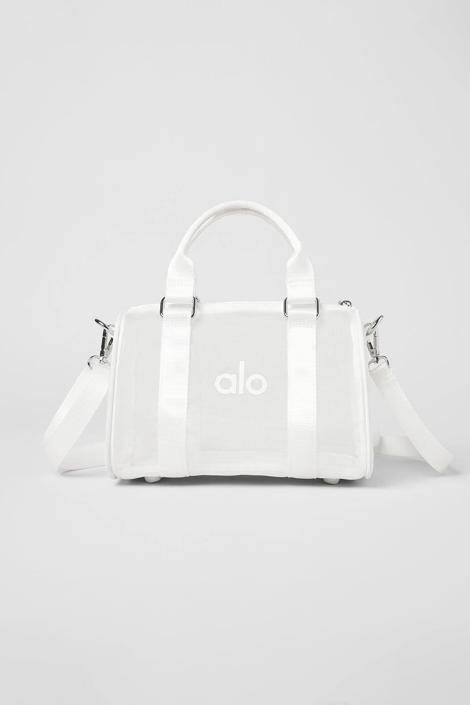 Front view of the white mini sheer duffle bag with top handles.