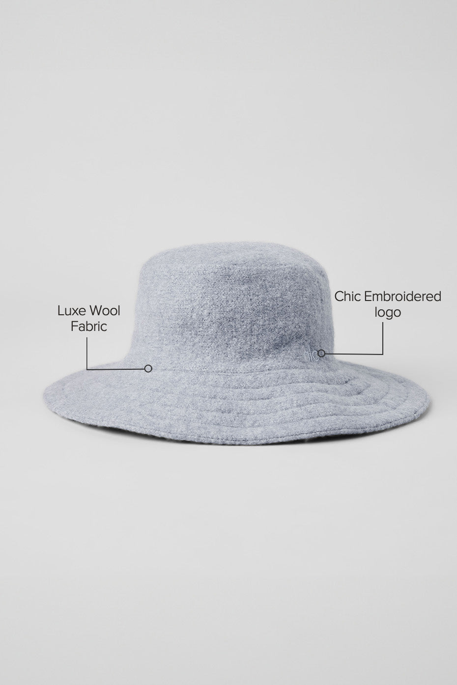 Model wearing the wool bucket hat during outdoor winter walk, highlighting style and warmth