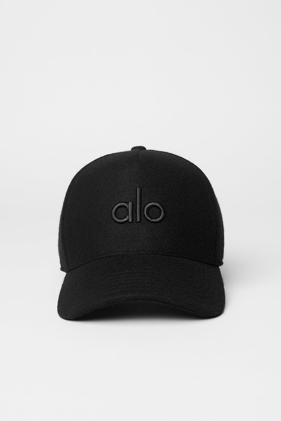 Side angle of the wool trucker hat, showcasing its stylish design.